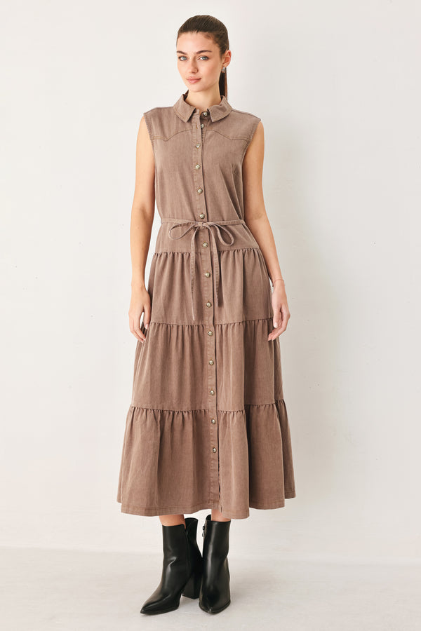 Woman wearing a sleeveless brown tiered midi dress featuring collar, button down, self tie and tier skirt | FREEMARKET