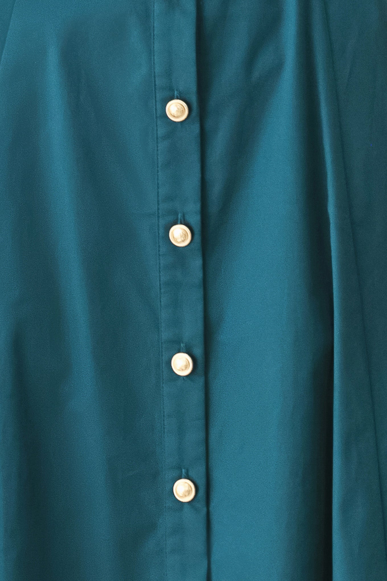 Woman wearing a teal blue midi dress featuring collar, elbow sleeve, front button down, self belt and circle skirt | FREEMARKET