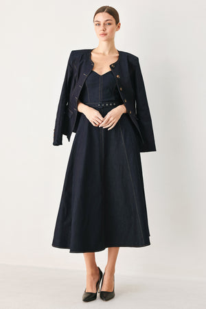 Woman wearing a dark denim strapless midi dress featuring a sweetheart neckline, self belt, circle skirt and back zipper closure | FREEMARKET