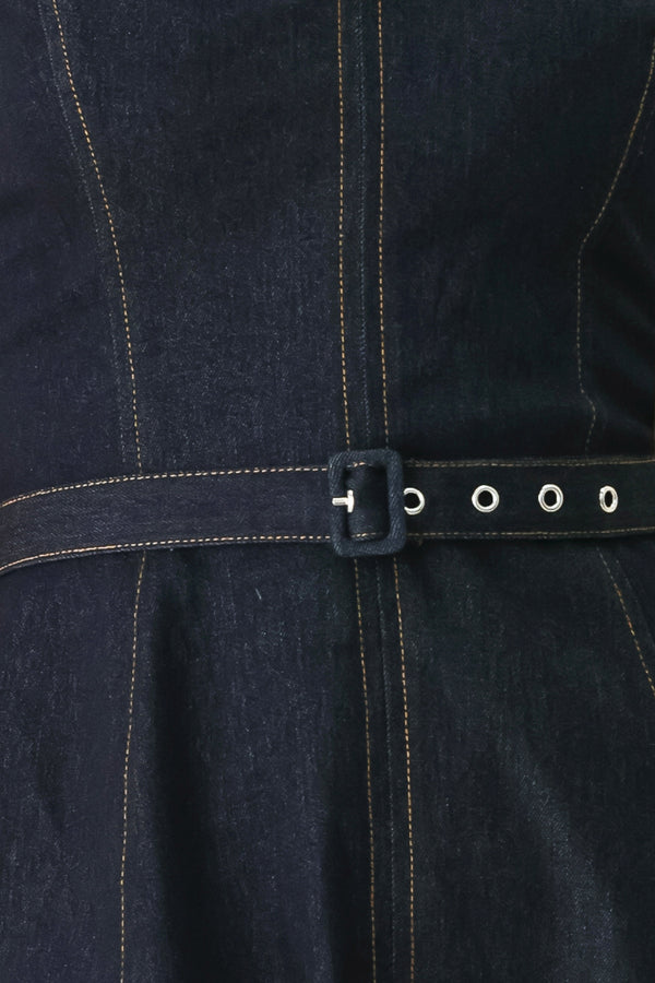 Woman wearing a dark denim strapless midi dress featuring a sweetheart neckline, self belt, circle skirt and back zipper closure | FREEMARKET