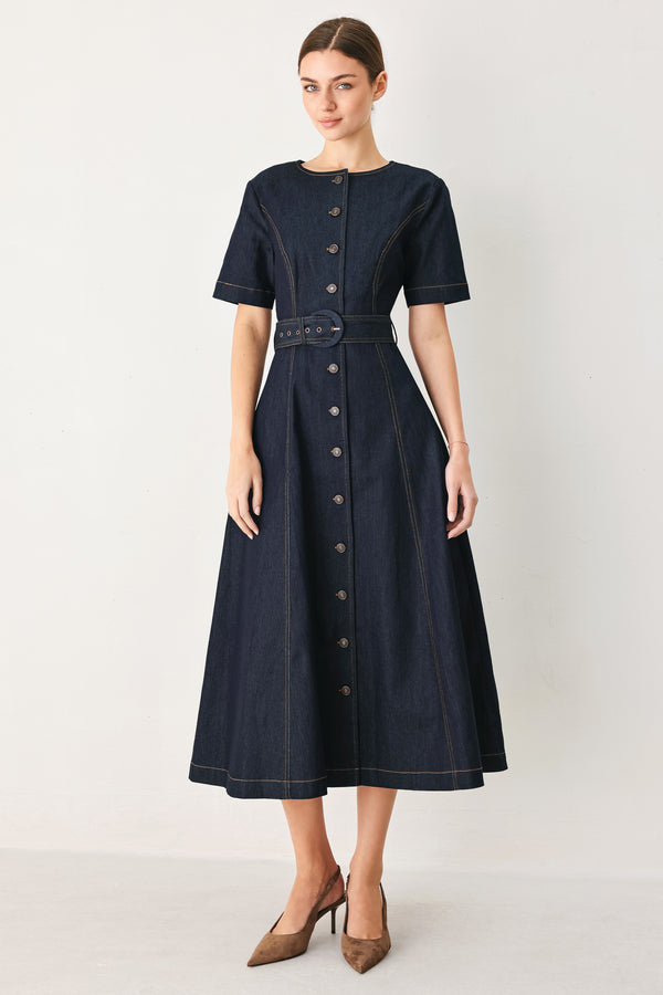 Woman wearing a navy dark denim midi dress with buttons and waist belt | FREEMARKET