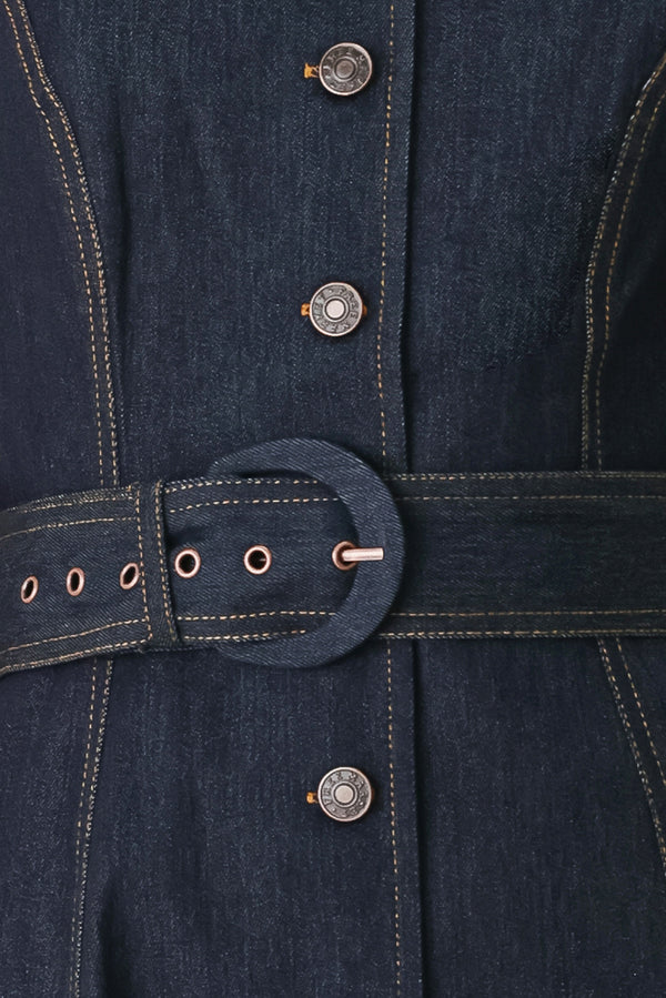 Woman wearing a navy dark denim midi dress with buttons and waist belt | FREEMARKET
