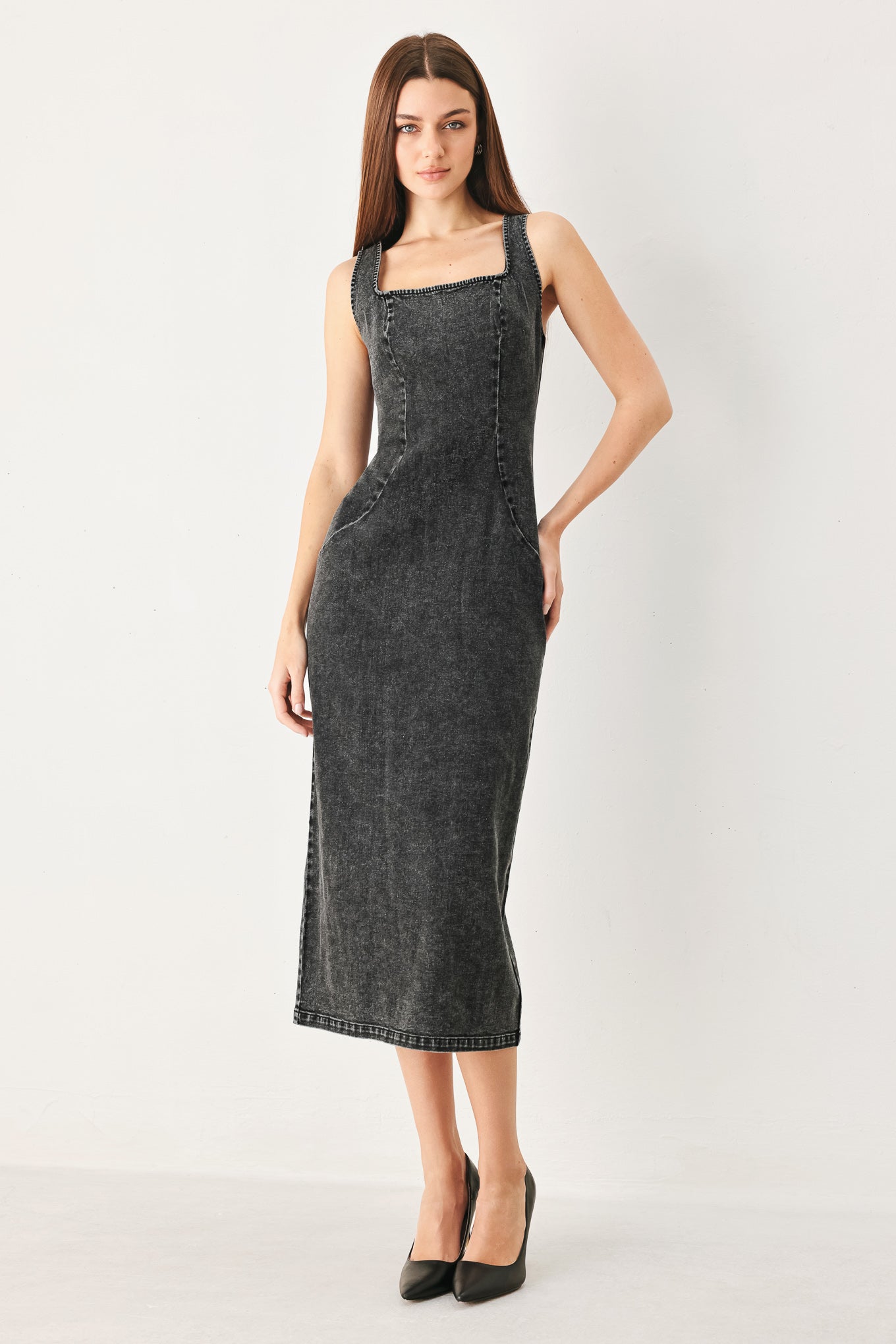 Woman wearing a washed black denim midi dress featuring square neckline, sleeveless and back zipper closure | FREEMARKET