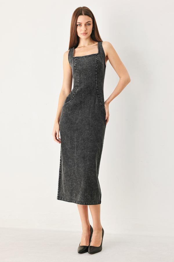 Woman wearing a washed black denim midi dress featuring square neckline, sleeveless and back zipper closure | FREEMARKET