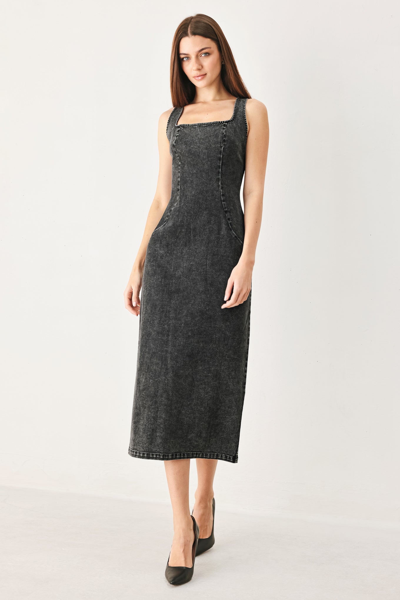 Woman wearing a washed black denim midi dress featuring square neckline, sleeveless and back zipper closure | FREEMARKET