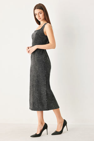 Woman wearing a washed black denim midi dress featuring square neckline, sleeveless and back zipper closure | FREEMARKET