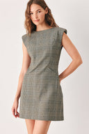 A woman wearing a sleeveless, min gray plaid dress with structured shoulders | FREEMARKET