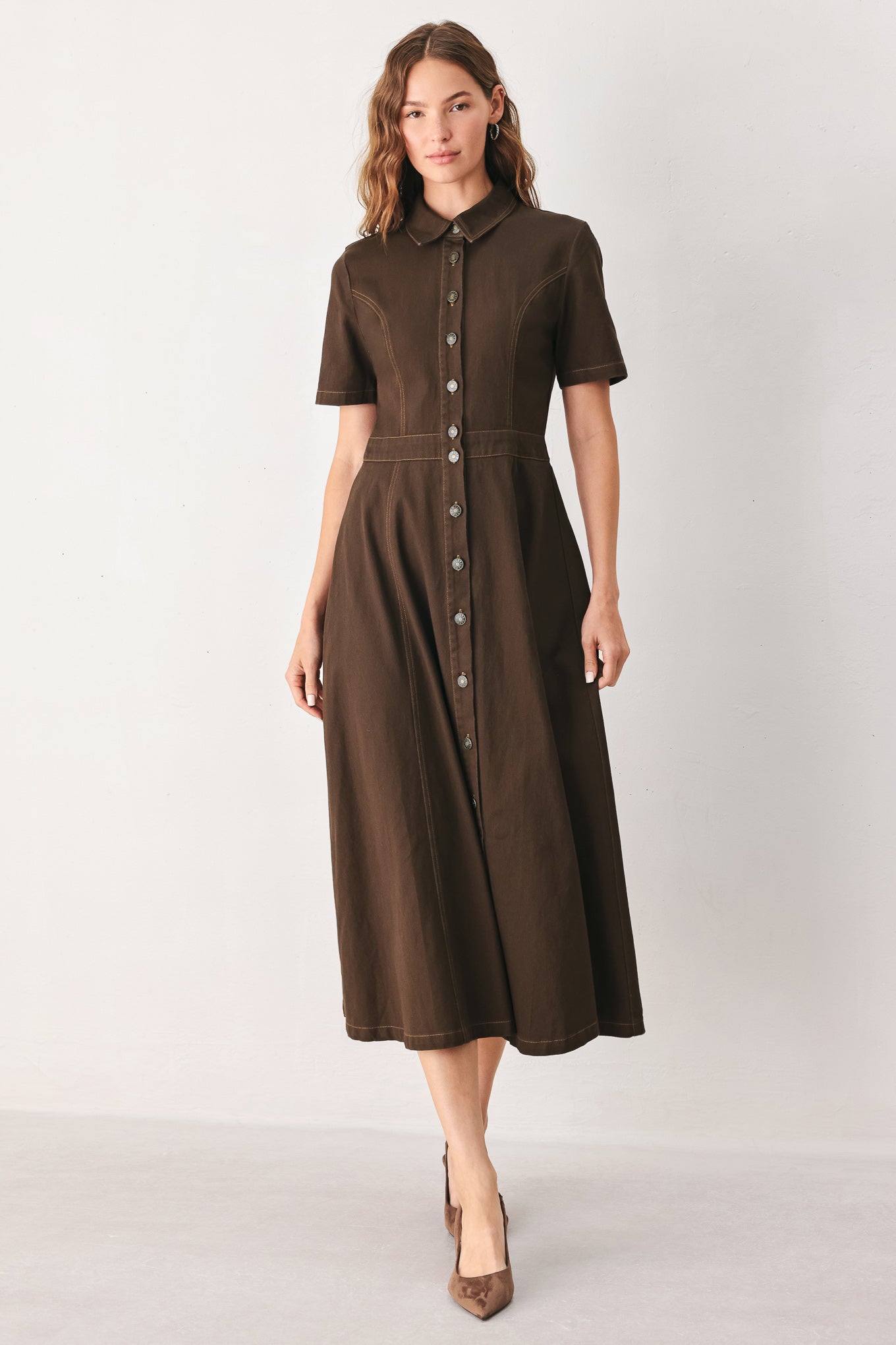 A woman modeling a dark brown short-sleeve midi shirt dress with a button-down front and a defined waist seam | FREEMARKET