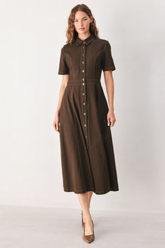 A woman modeling a dark brown short-sleeve midi shirt dress with a button-down front and a defined waist seam | FREEMARKET