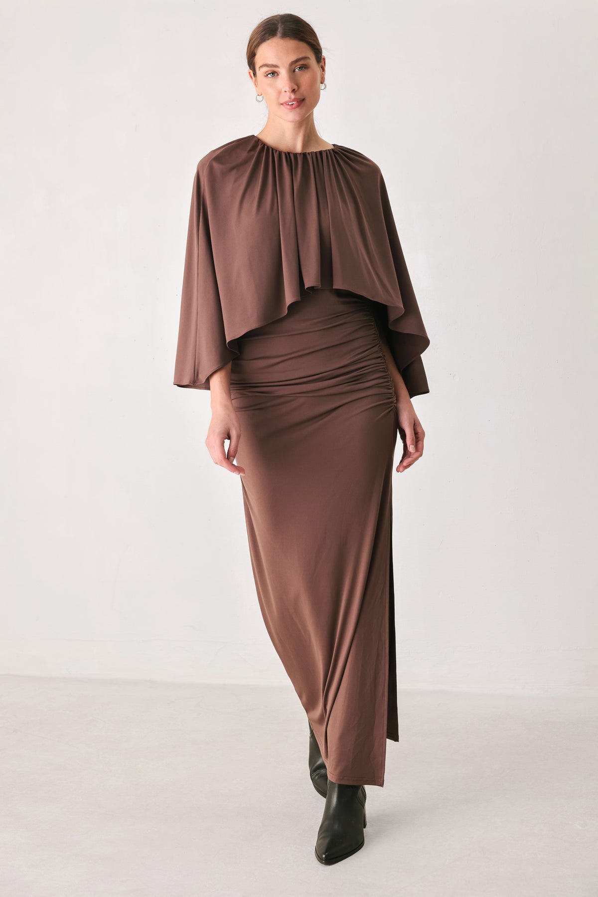Woman wearing a brown mauve maxi sheath dress with a caplet | FREEMARKET