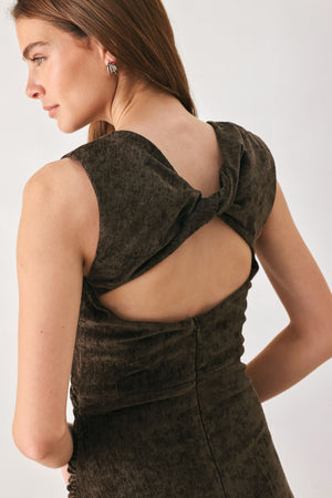 Woman wearing a brown sleeveless chenille midi dress with side ruching and asymmetrical hemline | FREEMARKET