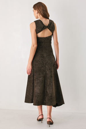 Woman wearing a brown sleeveless chenille midi dress with side ruching and asymmetrical hemline | FREEMARKET
