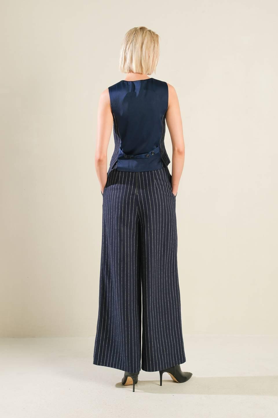 FOREVER CONNECTED WOVEN VEST.