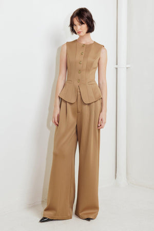 A solid woven vest featuring round neckline, sleeveless, front button down and pockets.