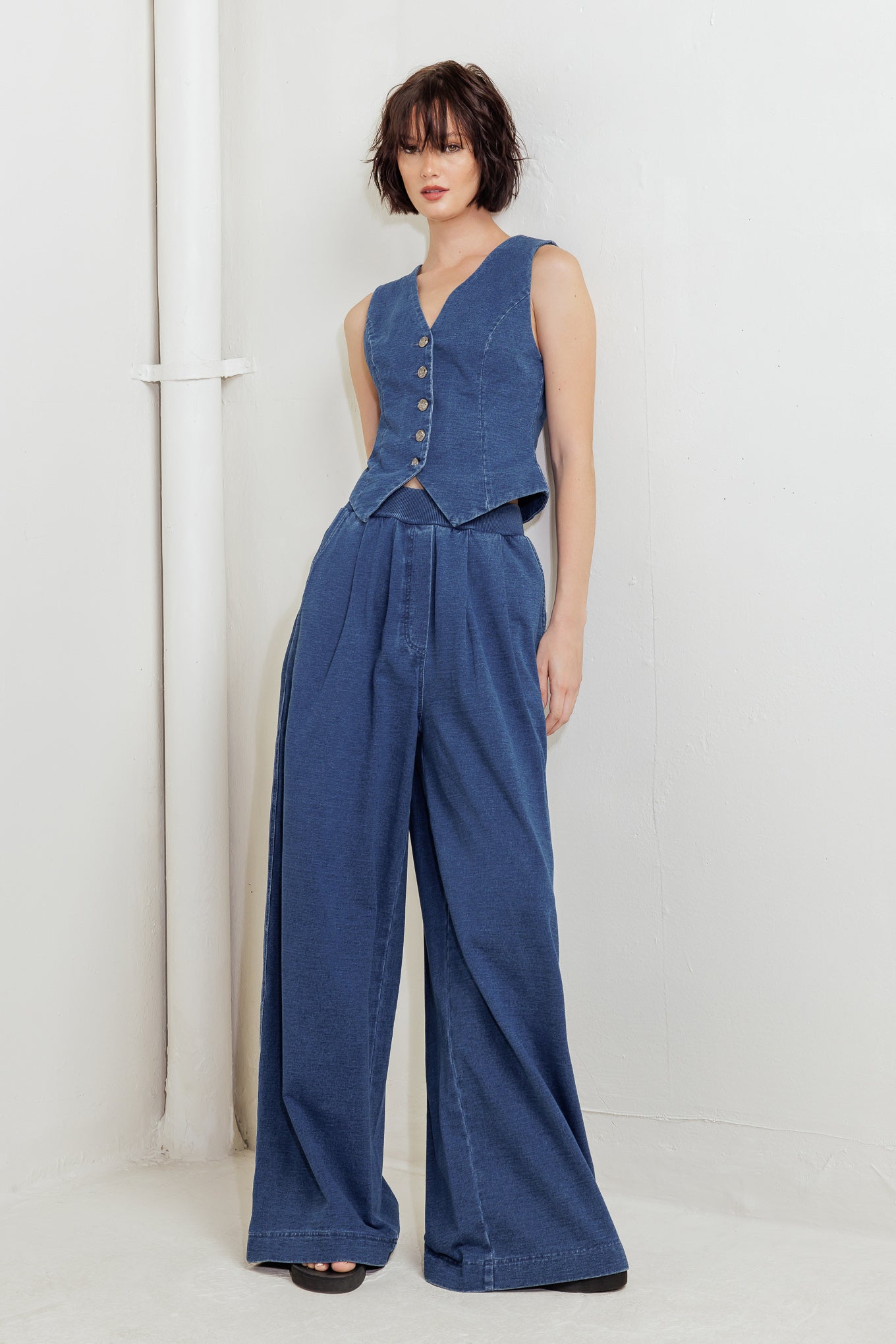 A washed french terry vest with front button down closure. Matching pant FP1724