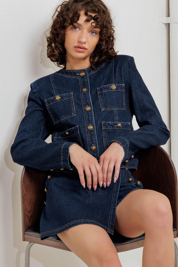 A washed denim jacket with round neck, button down and pockets