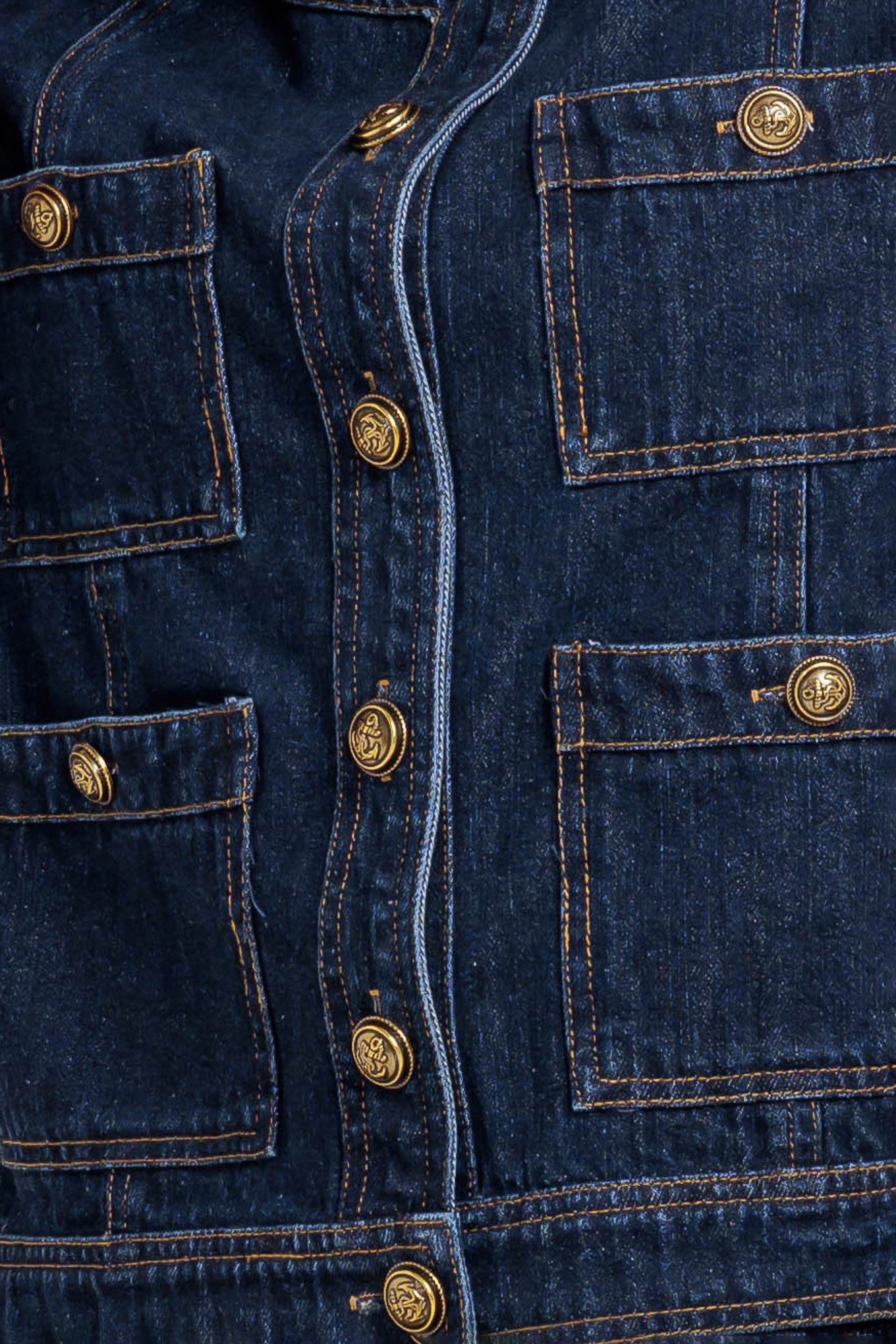 A washed denim jacket with round neck, button down and pockets