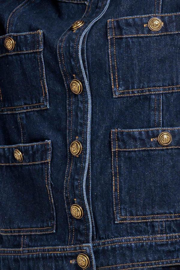 A washed denim jacket with round neck, button down and pockets