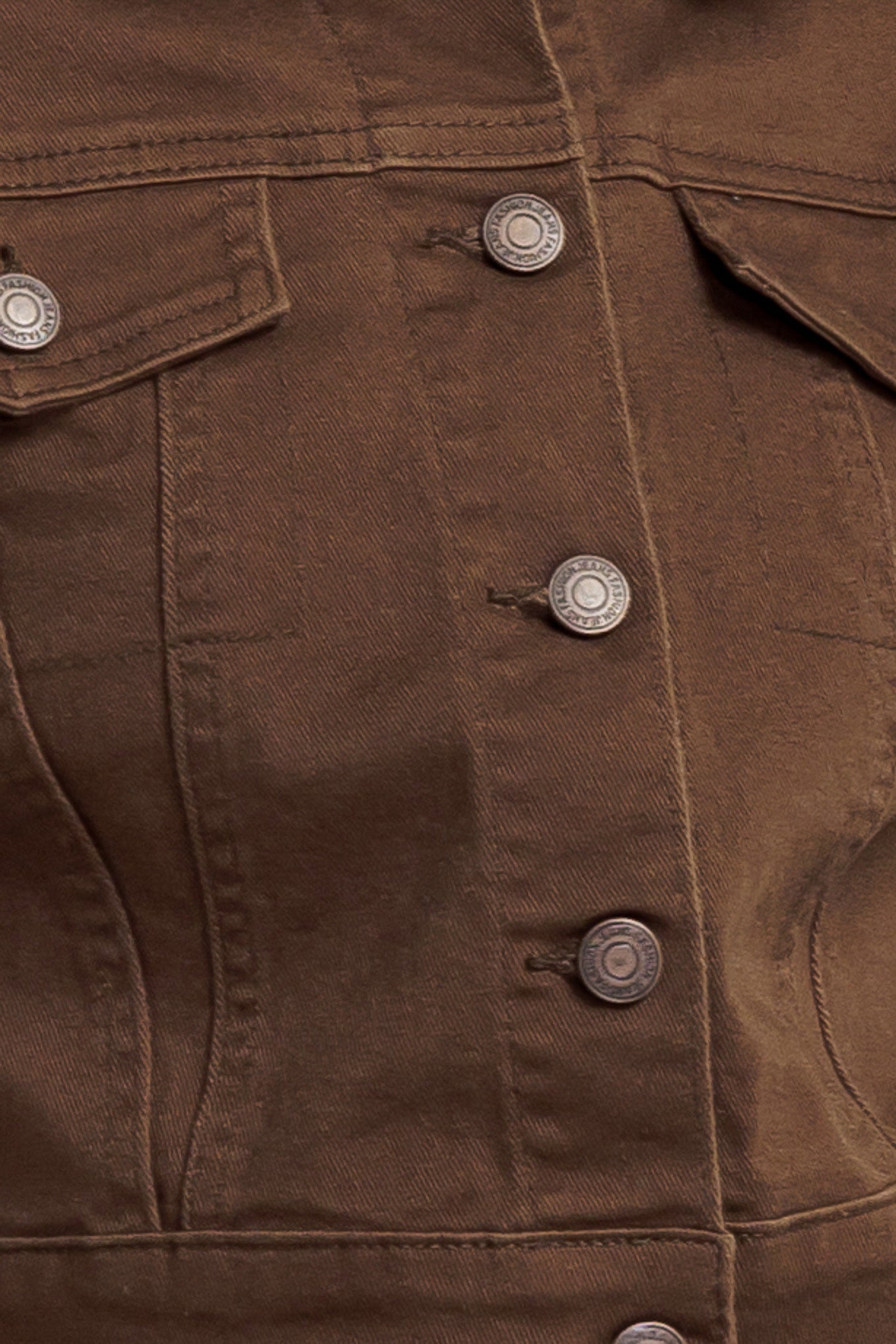 Woman wearing a brown short sleeve twill jacket with front button closure | FREEMARKET