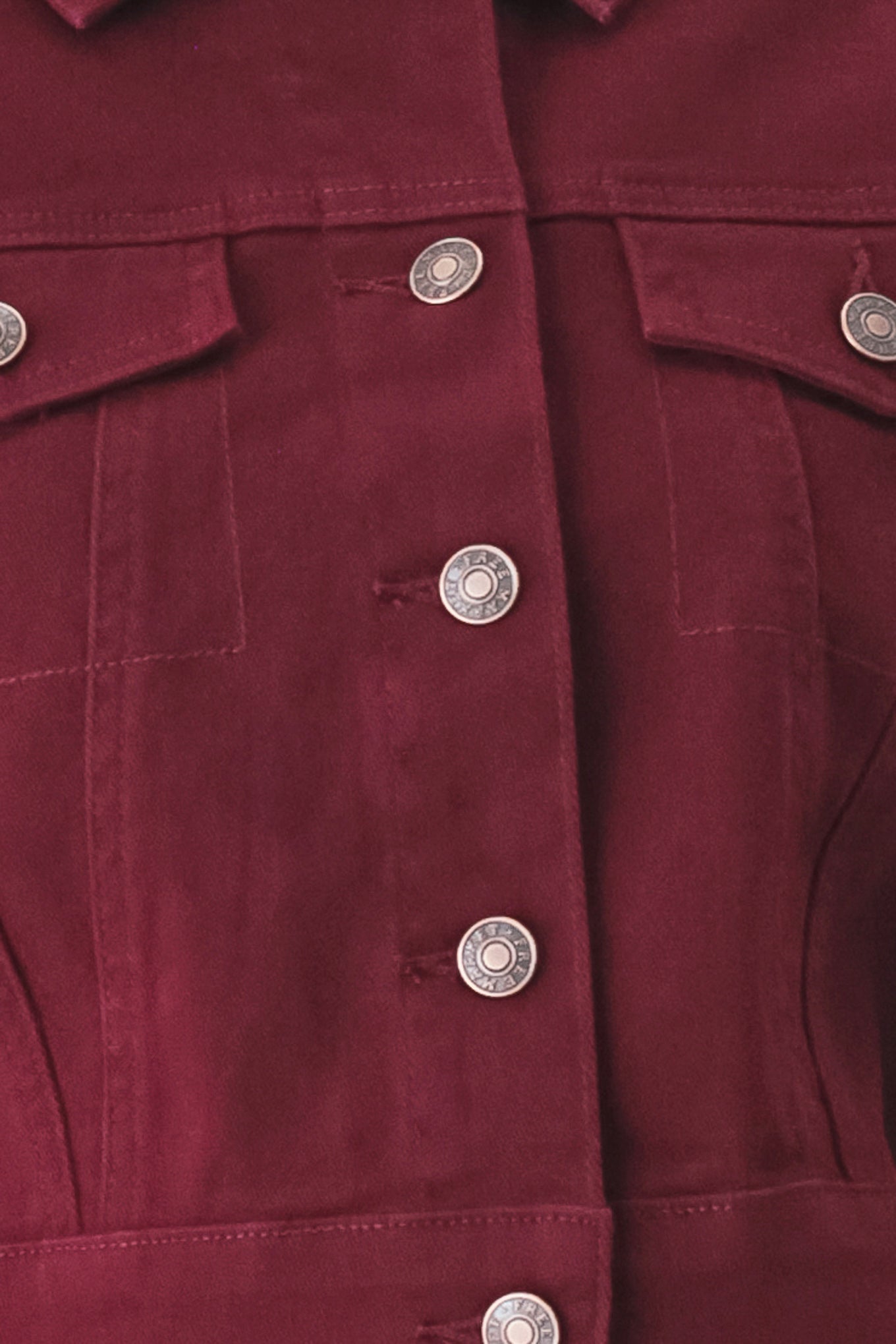 Woman wearing a burgundy short sleeve twill jacket with front button closure | FREEMARKET
