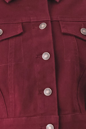 Woman wearing a burgundy short sleeve twill jacket with front button closure | FREEMARKET
