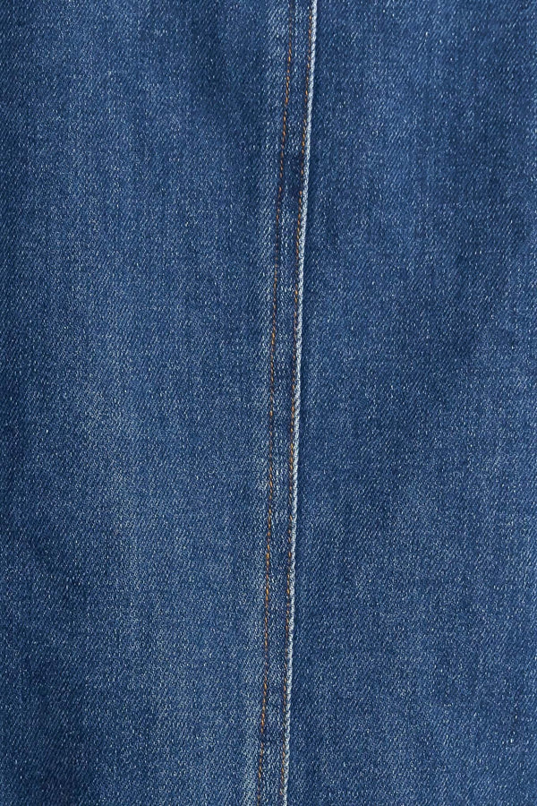 A washed denim jacket featuring round neckline, braided trim and hook &amp; eye closure