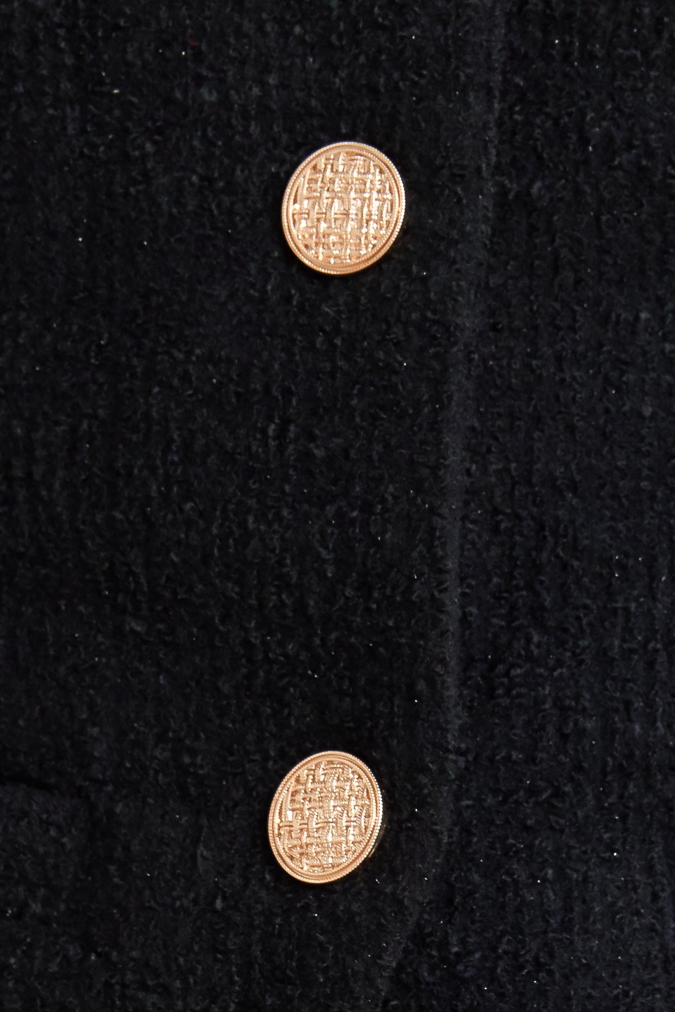 A woven vest featuring collar, sleeveless and front button closure.