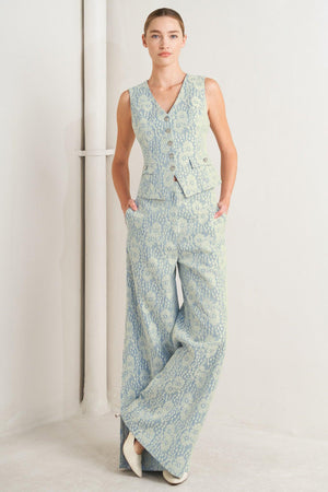 A woven bonded lace vest featuring V neckline, sleeveless and button down

Details:

Self: 50% Rayon 50% Polyester

Size & Fit

-Model is 5`8" And Wearing Size Small
-Measurements Taken From Size Small
-Approx. Length: 22"