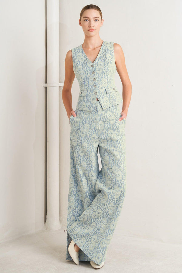 A woven bonded lace vest featuring V neckline, sleeveless and button down

Details:

Self: 50% Rayon 50% Polyester

Size & Fit

-Model is 5`8" And Wearing Size Small
-Measurements Taken From Size Small
-Approx. Length: 22"
