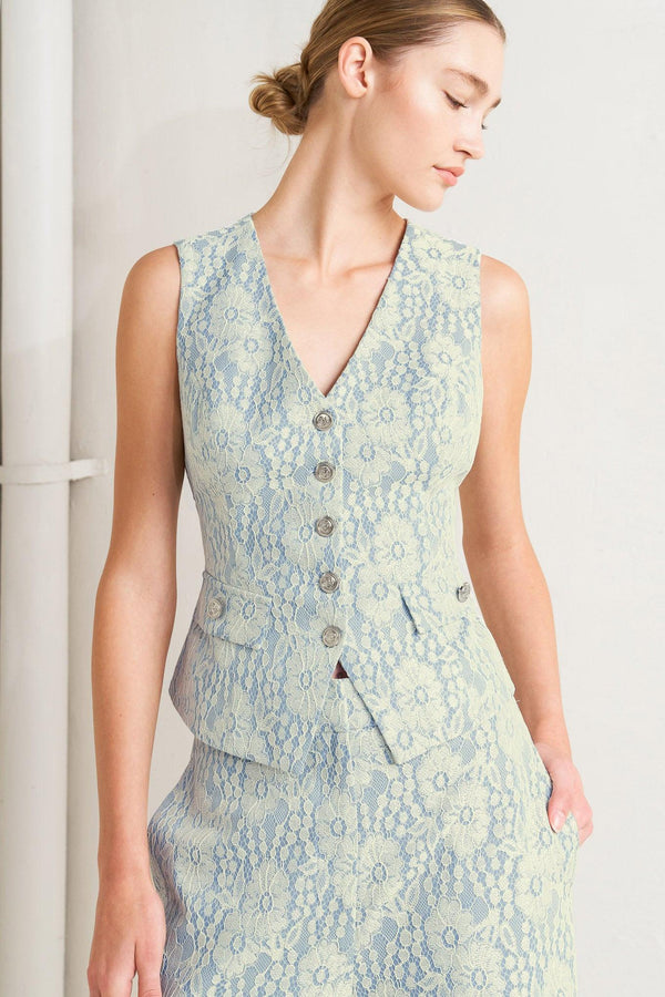 A woven bonded lace vest featuring V neckline, sleeveless and button down

Details:

Self: 50% Rayon 50% Polyester

Size & Fit

-Model is 5`8" And Wearing Size Small
-Measurements Taken From Size Small
-Approx. Length: 22"