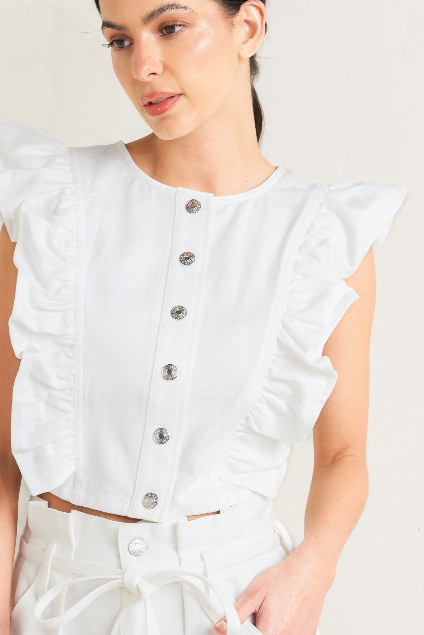 
A twill top featuring round neckline with ruffle detail

Details:

Self : 100% Cotton

Size &amp; Fit

- Model is 5`8" And Wearing Size Small
- Measurements Taken From Size Small
- Approx. Length: 17"