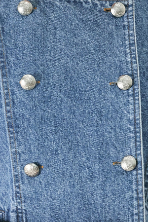 A washed denim jacket featuring round neckline, elbow sleeve, double button down and side pocket.