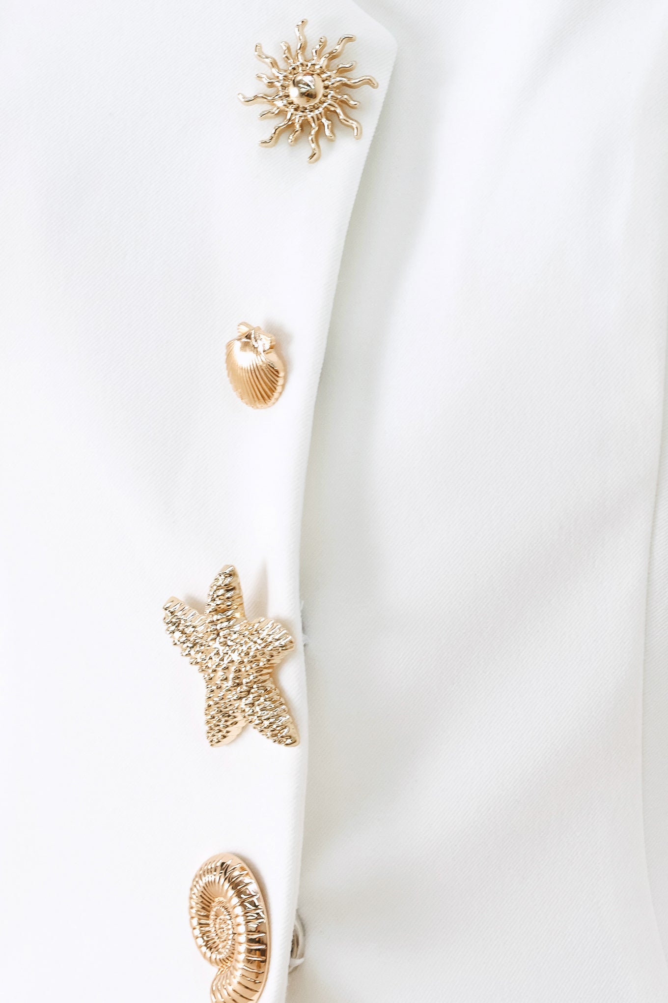 A solid woven vest featuring sweetheart neckline, button down and peplum.