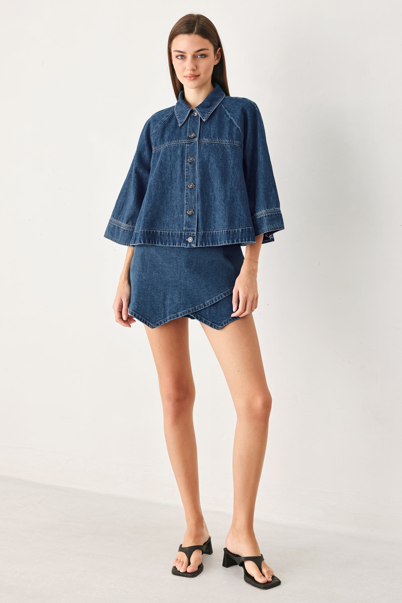 Woman wearing a denim jacket with 3/4 oversized sleeve and button down | FREEMARKET