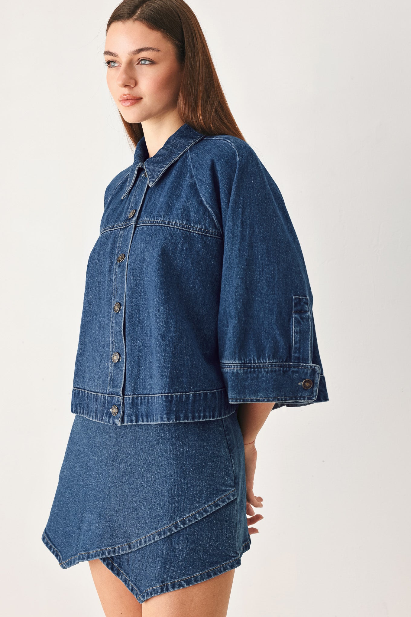 Woman wearing a denim jacket with 3/4 oversized sleeve and button down | FREEMARKET
