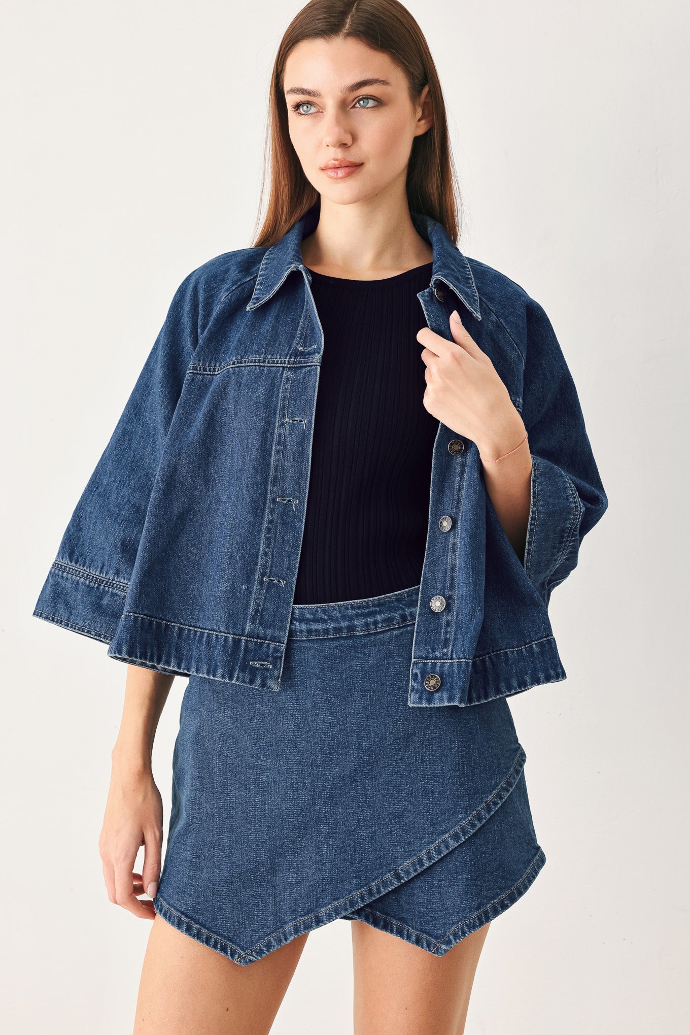 Woman wearing a denim jacket with 3/4 oversized sleeve and button down | FREEMARKET
