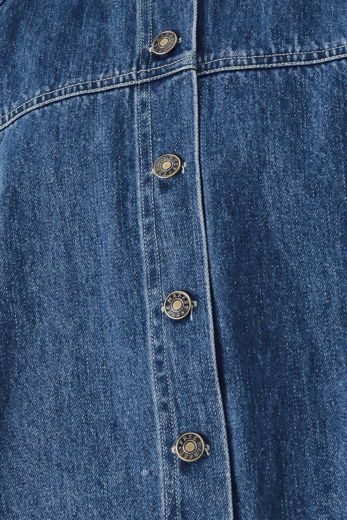 Woman wearing a denim jacket with 3/4 oversized sleeve and button down | FREEMARKET