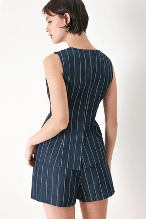 A striped woven vest with V neckline and front button down.