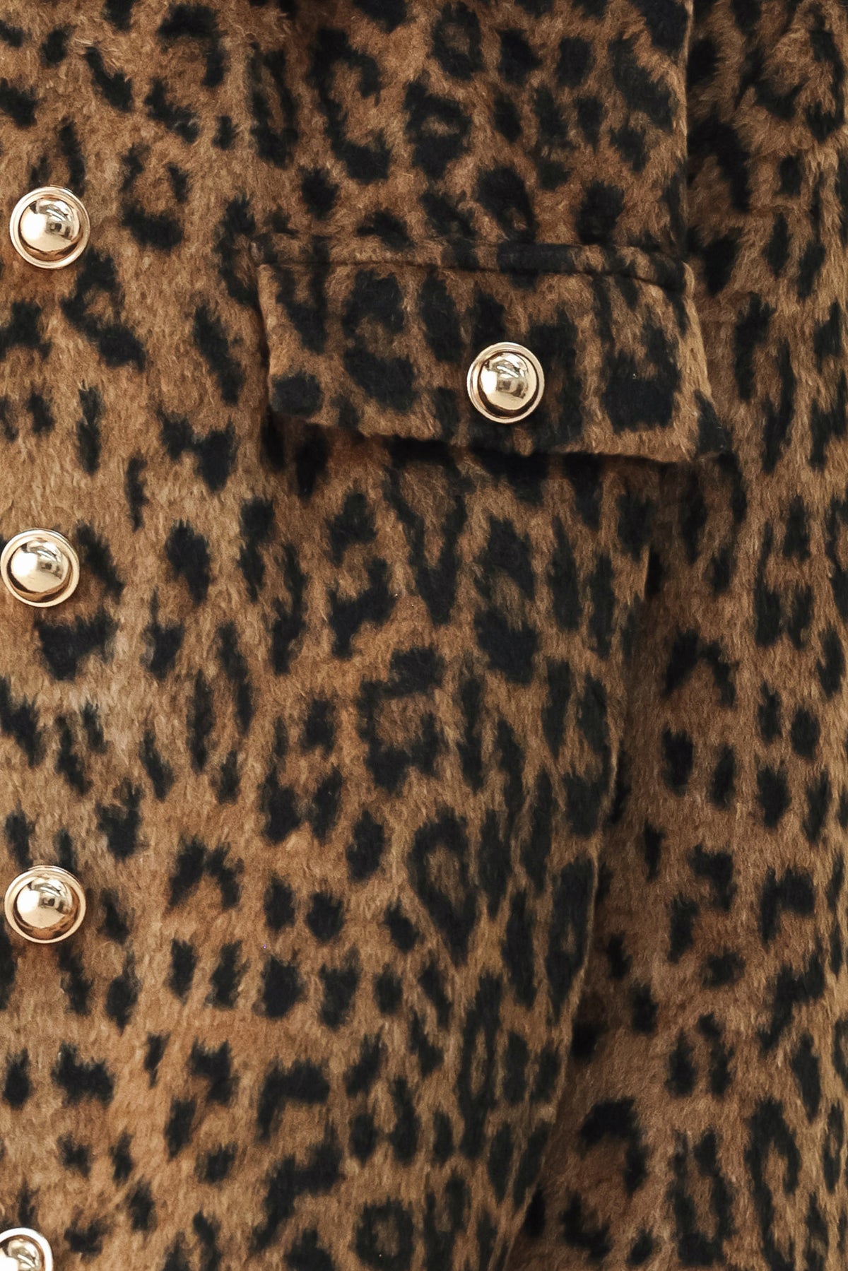 A model wearing a brown and black leopard print jacket with gold-tone buttons | FREEMARKET
