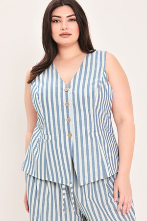 Woman wearing a a striped woven vest with front closure and sleeveless | FREEMARKET