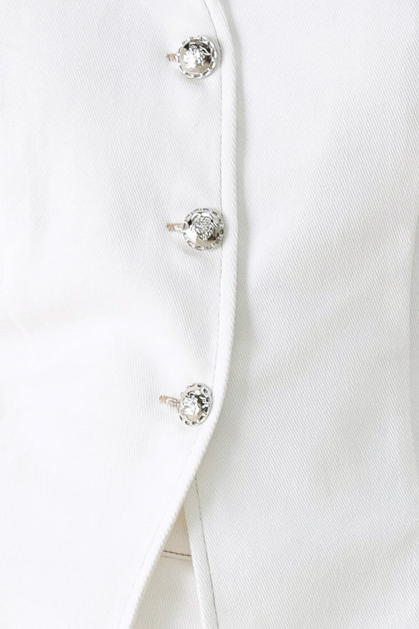 Close-up of a white vest with crystal buttons | FREEMARKET