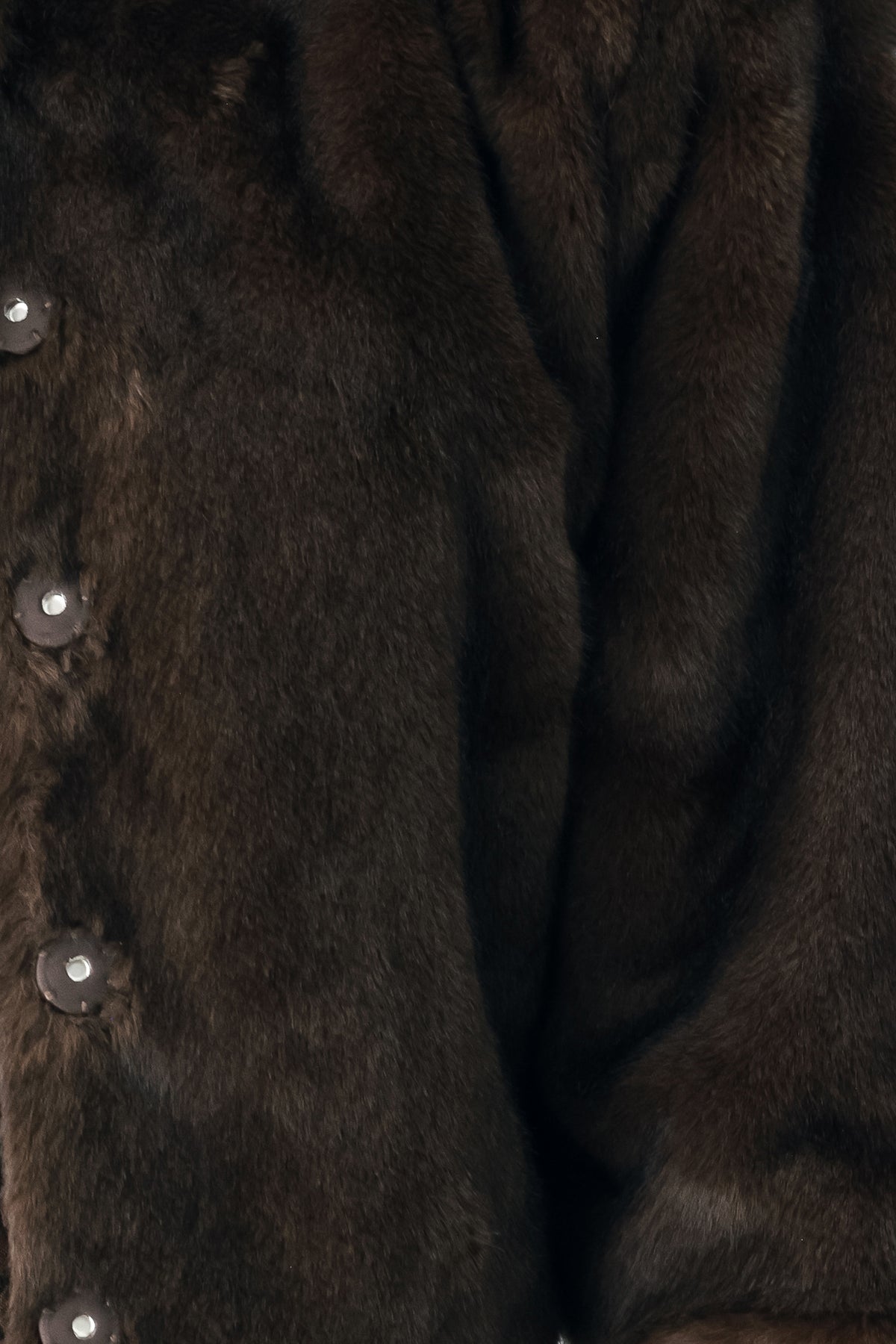 A model wearing a dark brown faux fur cropped jacket | FREEMARKET