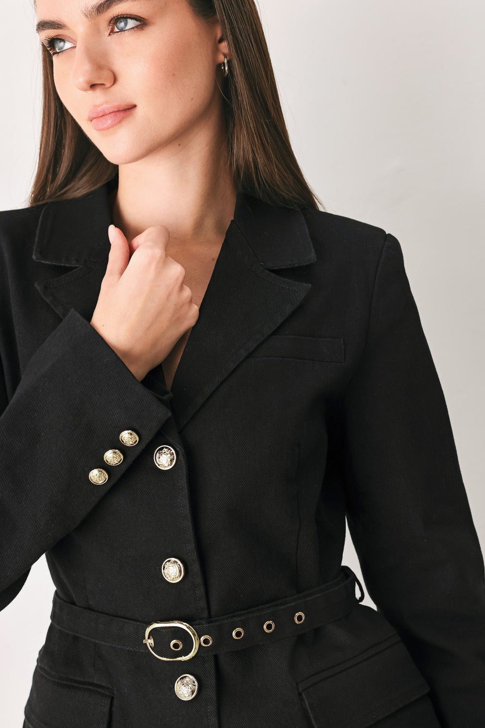 Woman wearing a black denim blazer jacket with gold tone buttons, waist  belt and faux front pockets | FREEMARKET