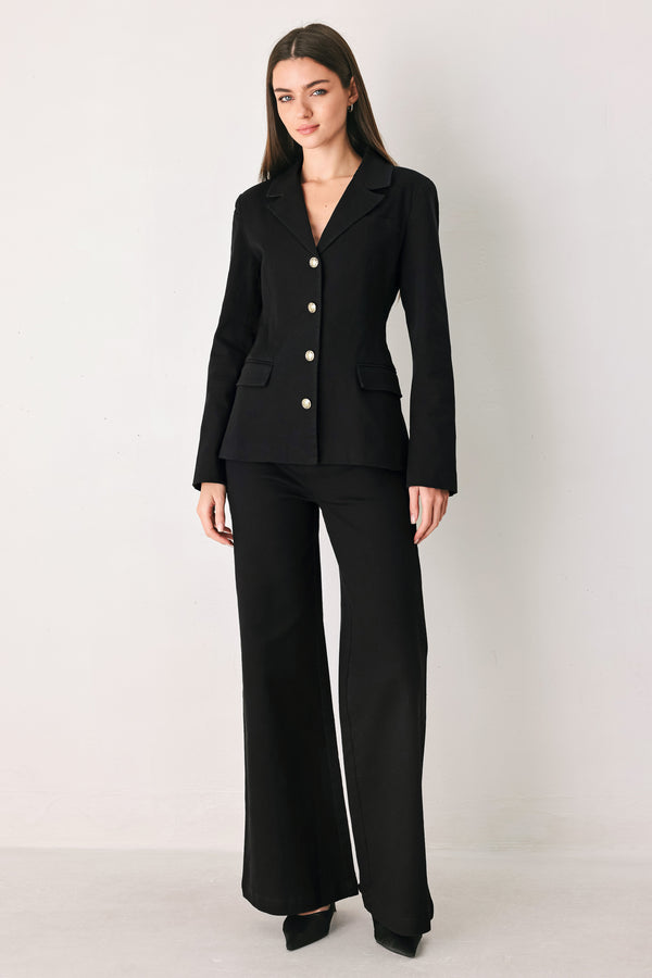 Woman wearing a black denim blazer jacket with gold tone buttons, waist  belt and faux front pockets | FREEMARKET