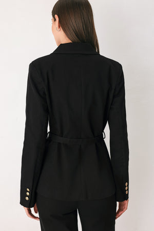 Woman wearing a black denim blazer jacket with gold tone buttons, waist  belt and faux front pockets | FREEMARKET