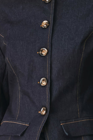 Woman wearing a dark denim jacket with round neckline, long sleeve and front button closure | FREEMARKET