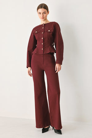 Woman wearing a long-sleeve jacket in deep burgundy with gold-tone buttons | FREEMARKET