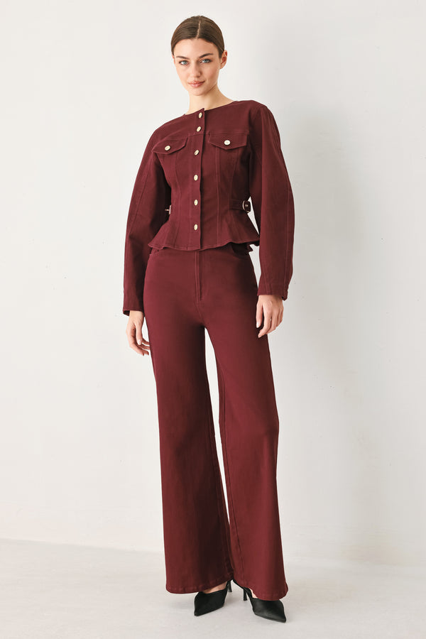 Woman wearing a long-sleeve jacket in deep burgundy with gold-tone buttons | FREEMARKET