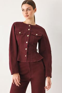Woman wearing a long-sleeve jacket in deep burgundy with gold-tone buttons | FREEMARKET