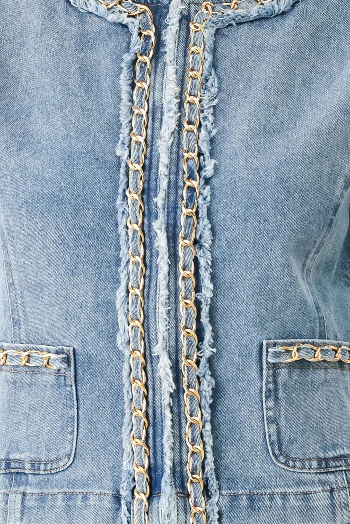 Woman wearing a light blue denim jacket featuring decorative gold chain trim and frayed details | FREEMARKET